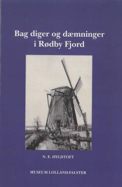 Bag diger og dæmninger i Rødby Fjord