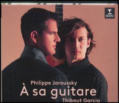 À sa guitare