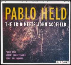 The trio meets John Scofield