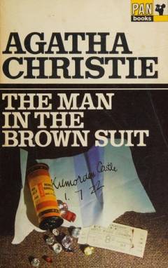 The man in the brown suit