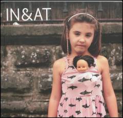 IN & AT