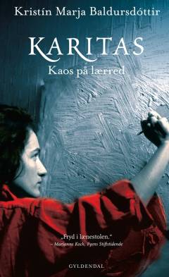 Karitas - kaos på lærred