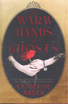 The warm hands of ghosts : a novel