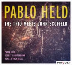 The trio meets John Scofield