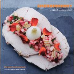 Smørrebrødet - og jomfruen der laver det